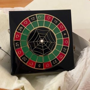 Charlotte Olympia Russian Roulette Cluch